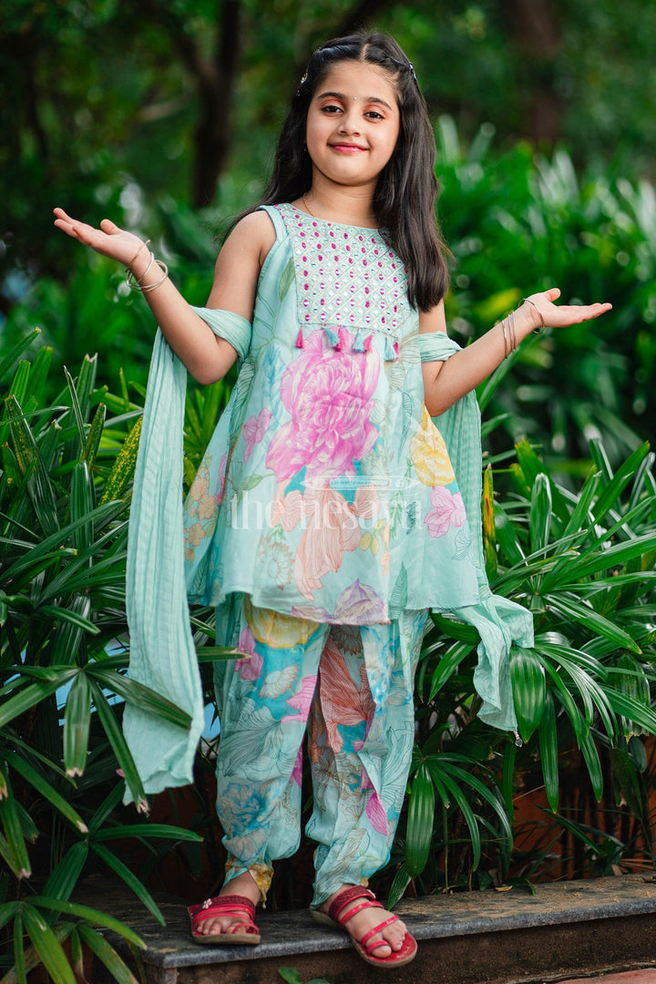 The Nesavu Girls Dothi Sets Aqua Floral Kurta and Dhoti Set for Girls with Sleeveless Kurta and Embellished Yoke Nesavu Nesavu Aqua Floral Girls Dhoti Set Sleeveless Kurta Tassel Embellishments