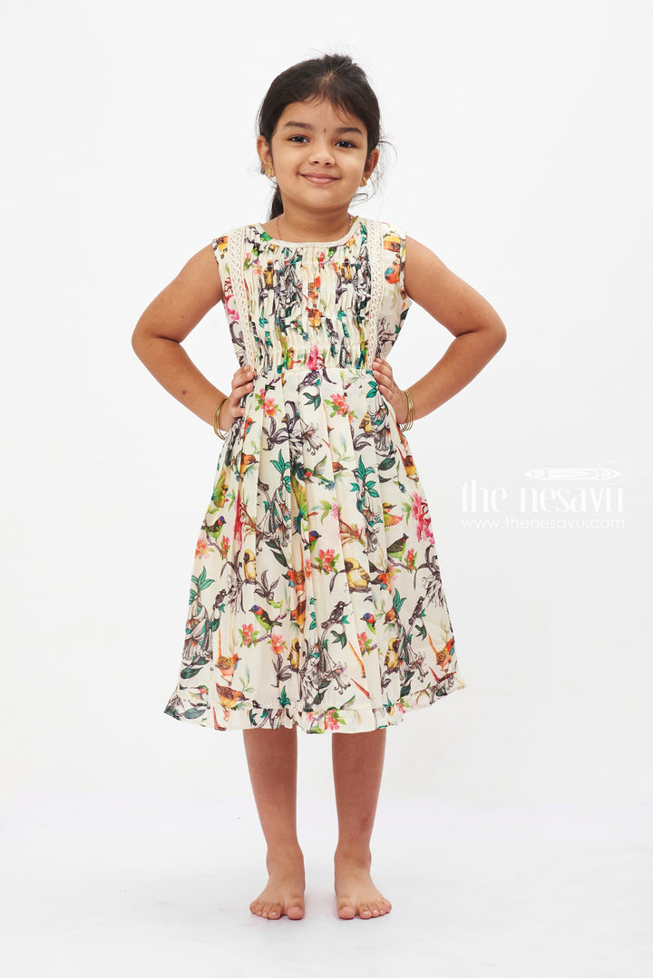 The Nesavu Girls Cotton Frock Aviary Elegance Summer Dress: Girls' Sleeveless Frock with Vivid Bird Print Nesavu 12 (3M) / Half white GFC1203A-12 Girls White Tropical Bird Print Dress | Sleeveless Lace Trim Frock | Summer Party Outfit | The Nesavu