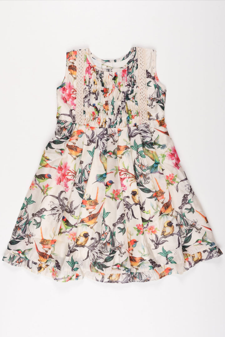 The Nesavu Girls Cotton Frock Aviary Elegance Summer Dress: Girls' Sleeveless Frock with Vivid Bird Print Nesavu 12 (3M) / Half white GFC1203A-12 Girls White Tropical Bird Print Dress | Sleeveless Lace Trim Frock | Summer Party Outfit | The Nesavu