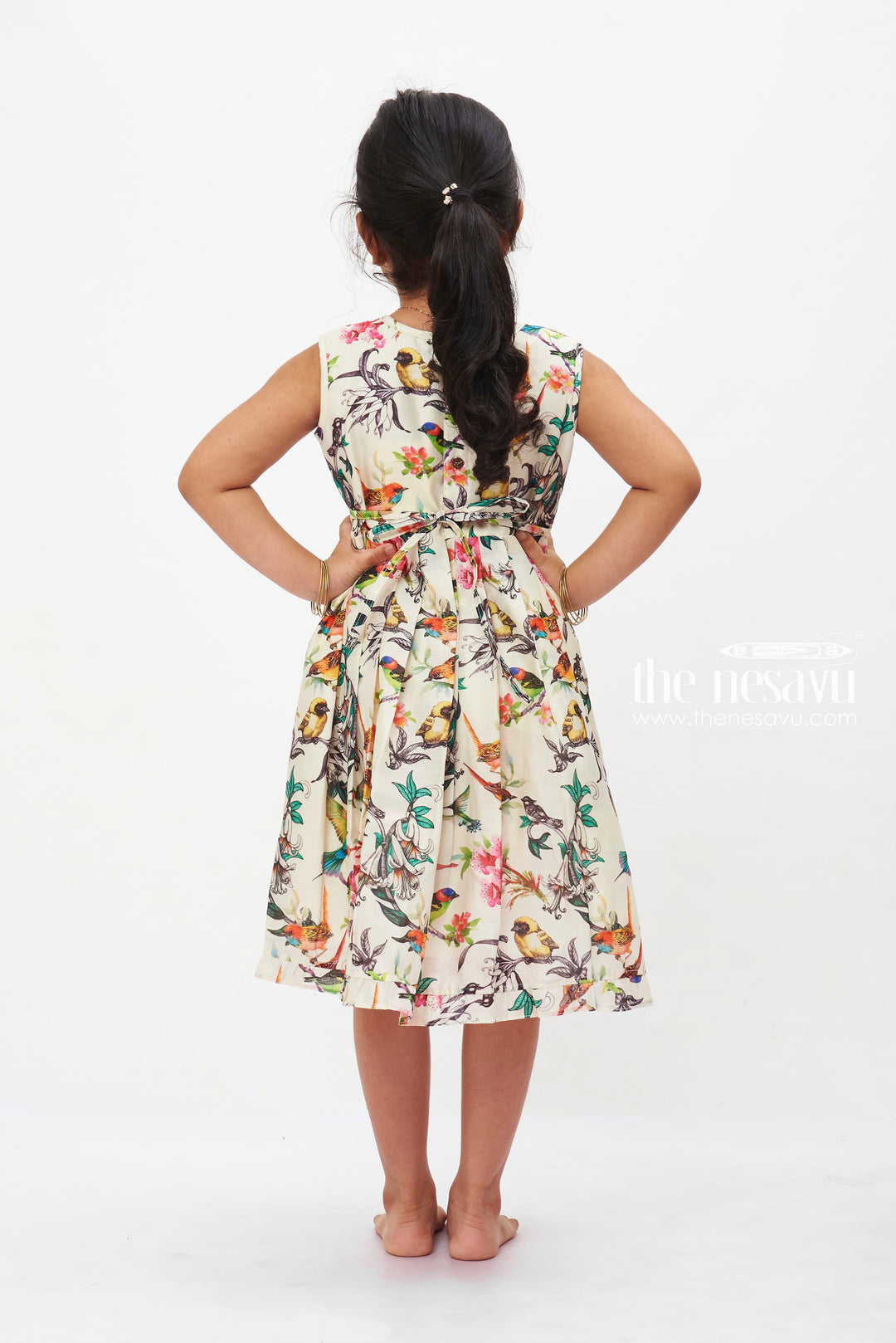 The Nesavu Girls Cotton Frock Aviary Elegance Summer Dress: Girls' Sleeveless Frock with Vivid Bird Print Nesavu Girls White Tropical Bird Print Dress | Sleeveless Lace Trim Frock | Summer Party Outfit | The Nesavu