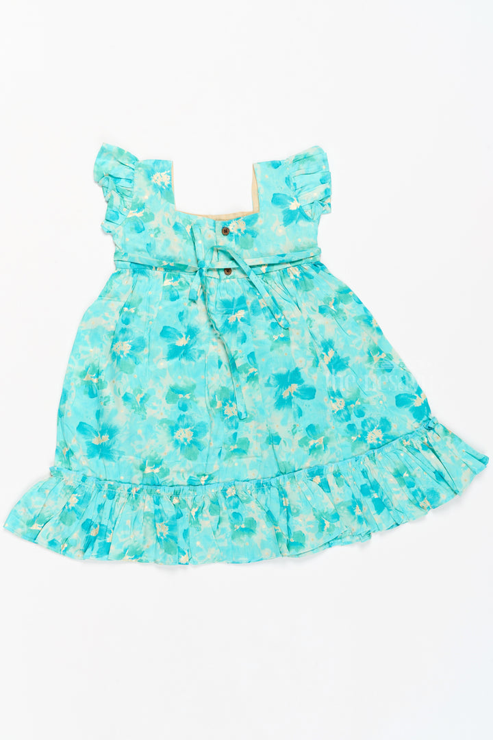 The Nesavu Girls Cotton Frock Baby Cotton Hug Clothing with Blue Floral Prints and Ruffled Design Nesavu Nesavu Baby Cotton Hug Clothing Floral Prints Ruffled Hem Blue