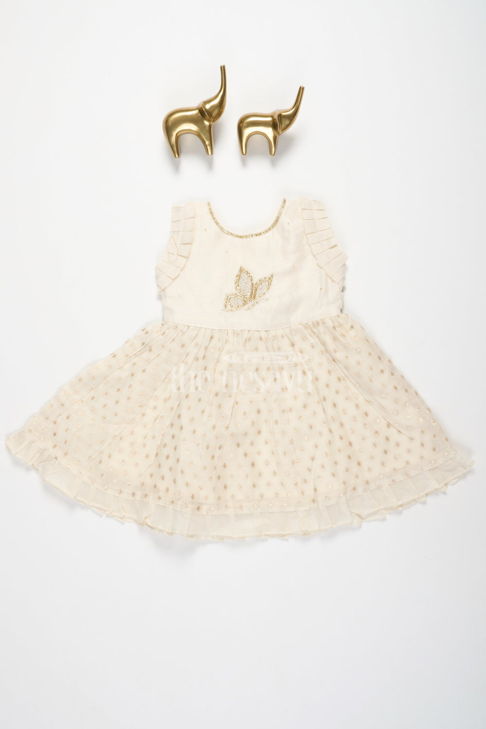 The Nesavu Girls Cotton Frock Baby Fancy Frock in Cream with Golden Accents and Ruffled Sleeves Nesavu Nesavu Baby Fancy Frock Cream Golden Butterfly Motif Ruffled Hem