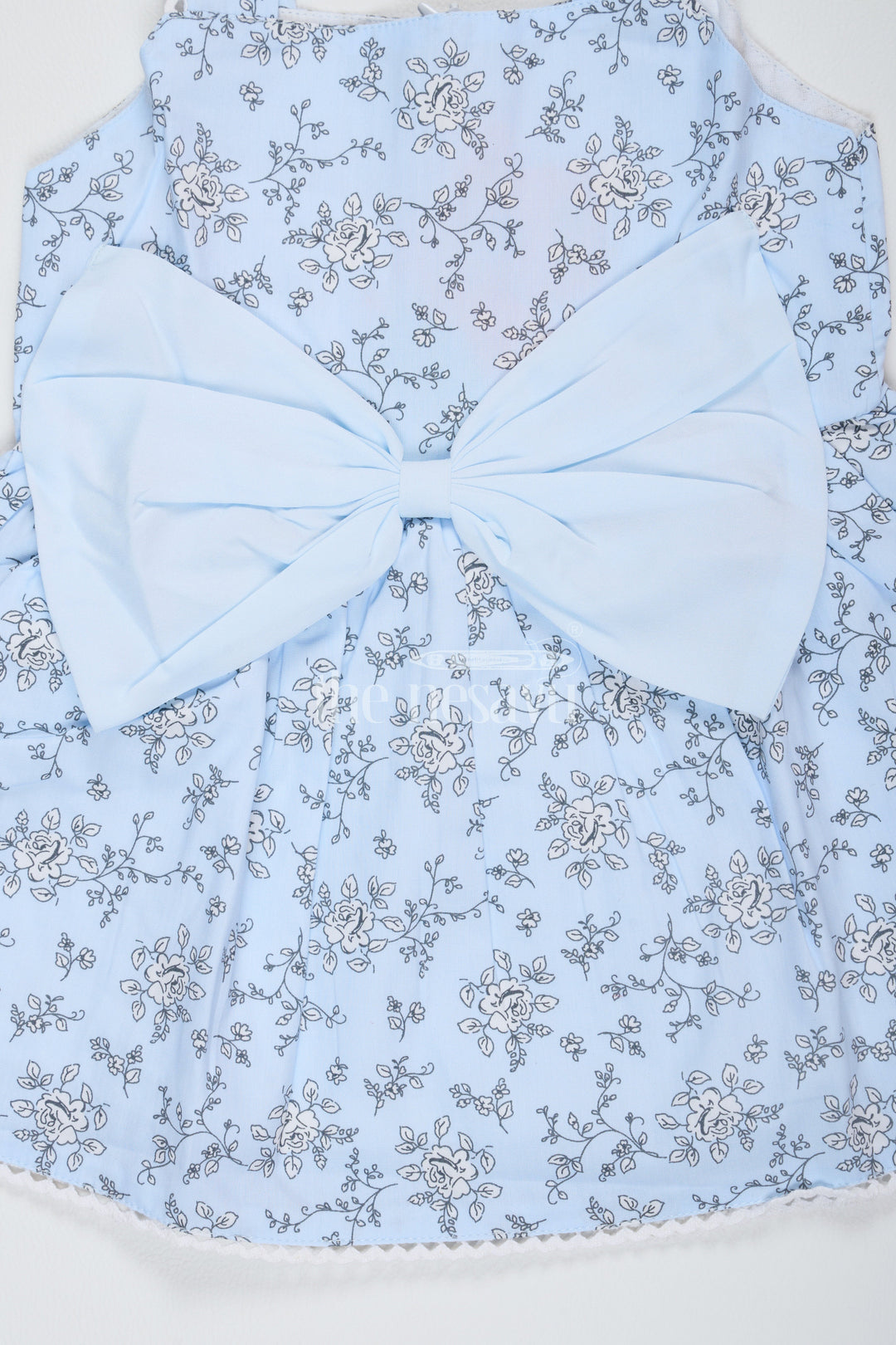 The Nesavu Baby Fancy Frock Baby Girls Blue Cotton Floral Frock with Large Bow and Lace Detailing for Casual Outings Nesavu Nesavu Baby Girls Blue Cotton Frock Floral Print Bow Accent Lace Details Summer Parties