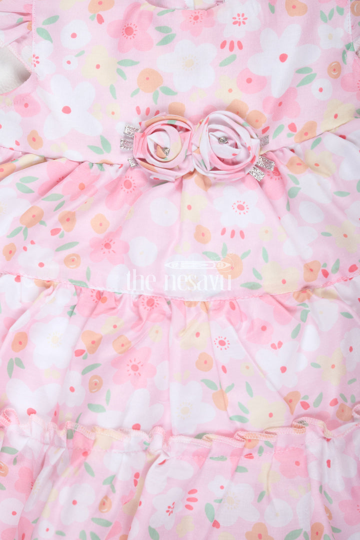 The Nesavu Baby Cotton Frocks Baby Girls Pink Floral Frock with Tiered Skirt and Bow Accent for Casual Outings Nesavu Nesavu Baby Girls Pink Floral Frock Tiered Skirt Bow Detail Playdates Birthday Parties