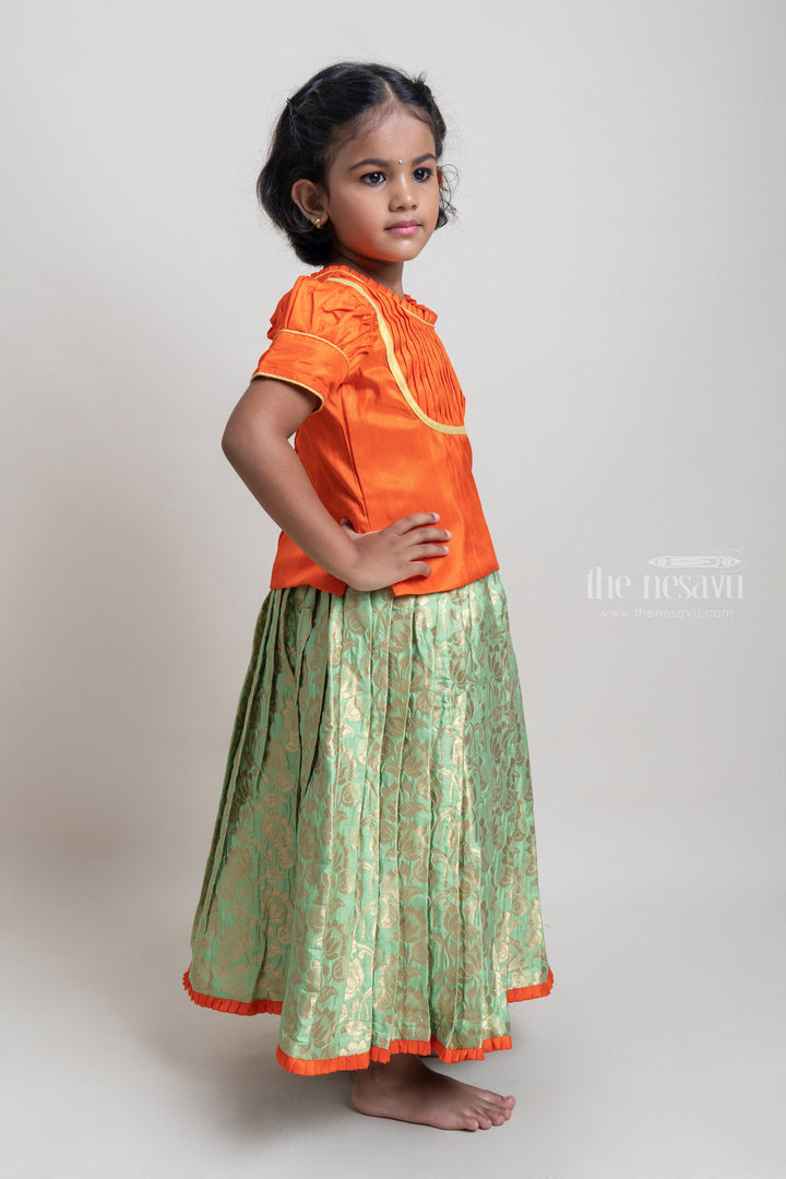 The Nesavu Pattu Pavadai Beautiful Traditional Orange Silk Blouse With Green Pleated Designer Pattu Pavadai Nesavu Silk Pavada For Girls | Premium Silk Frock Onine | The Nesavu