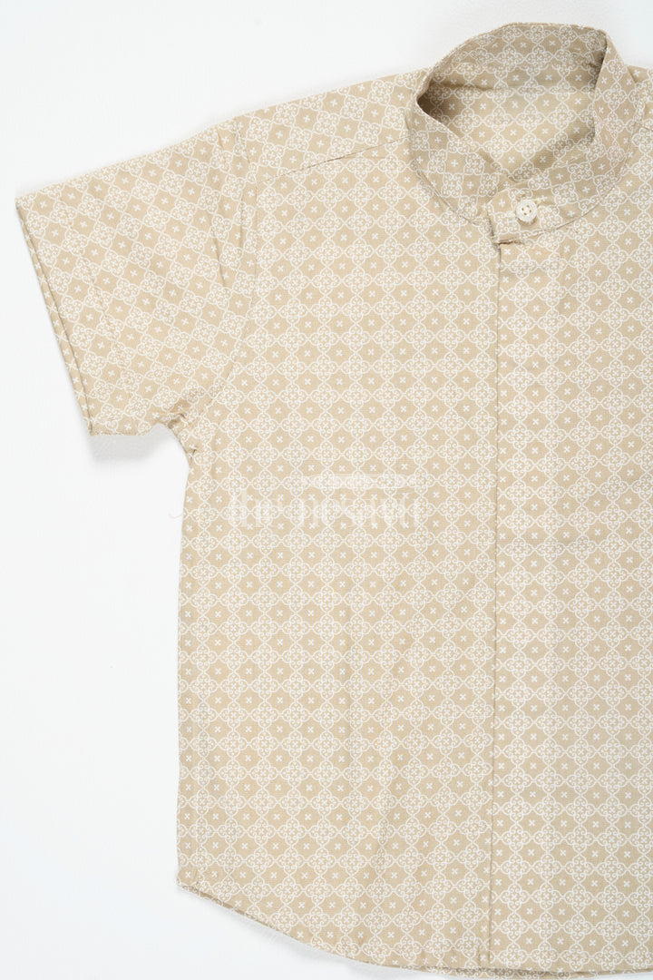 The Nesavu Boys Cotton Shirt Beige Festive Cotton Shirt for Boys with Geometric Print Half Sleeves Comfortable Fit Nesavu Beige Festive Boys Cotton Shirt Nesavu Geometric Print Half Sleeves Comfortable Wear Celebrations