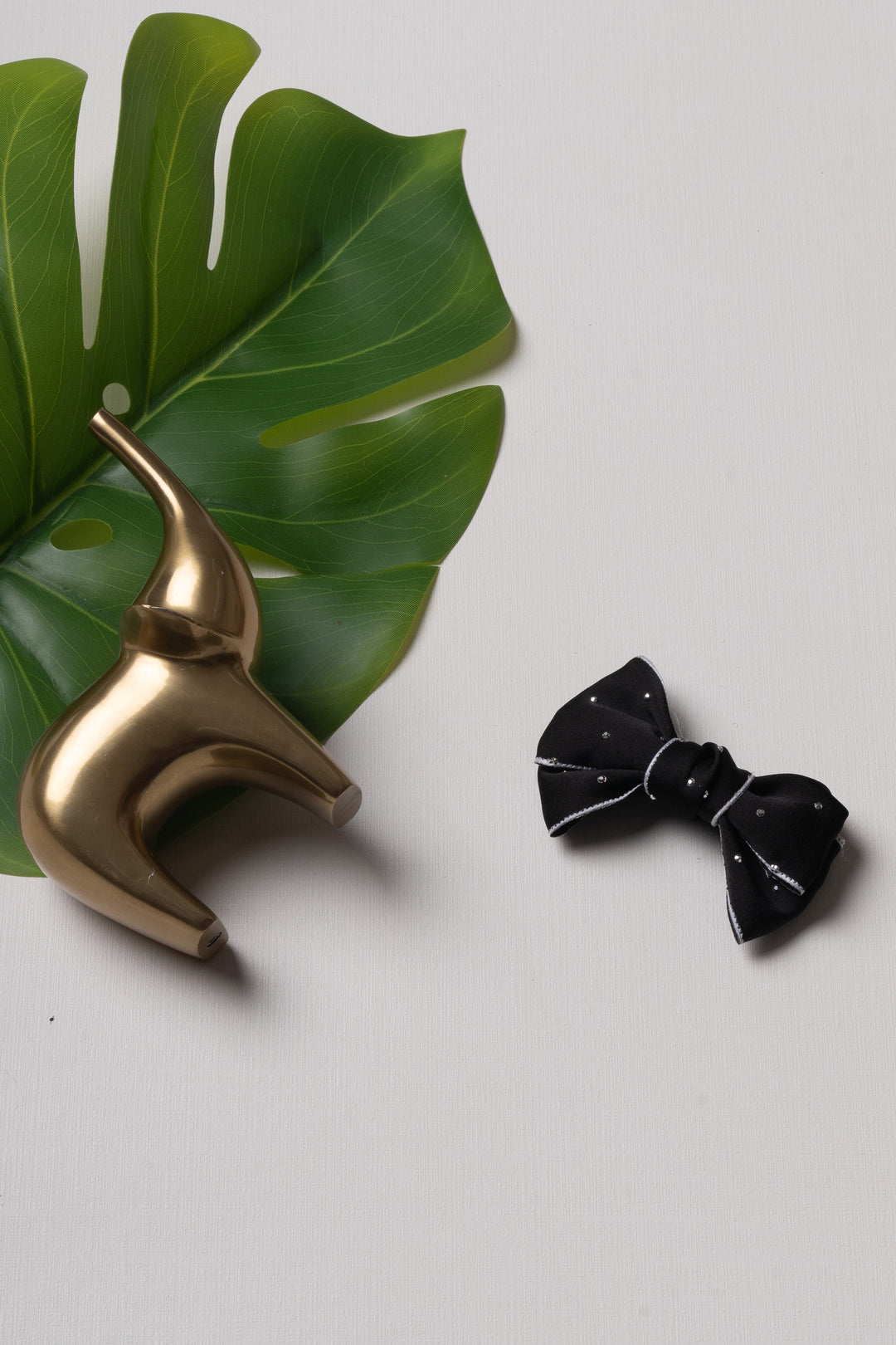 The Nesavu Hair Clip Black Satin Rhinestone Bow Hair Clip for Stylish Girls Nesavu Black JHCL72B Black bow clip for kids | Sophisticated hair clip for girls | The Nesavu