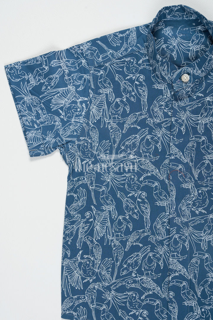 The Nesavu Boys Cotton Shirt Blue Boys Cotton Half Jeans Shirt with Bird Print Half Sleeves Casual and Stylish Nesavu Blue Bird Print Boys Cotton Half Jeans Shirt Nesavu Trendy Half Sleeves Casual Wear Family Outings