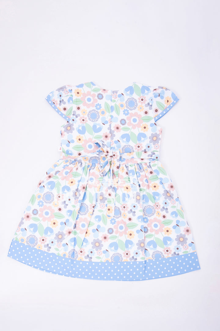 The Nesavu Girls Fancy Frock Blue Polka Dot and Floral Frock with Bow Embellishment Nesavu Blue Polka Dot and Floral Frock with Bow Embellishment for Girls - Nesavu