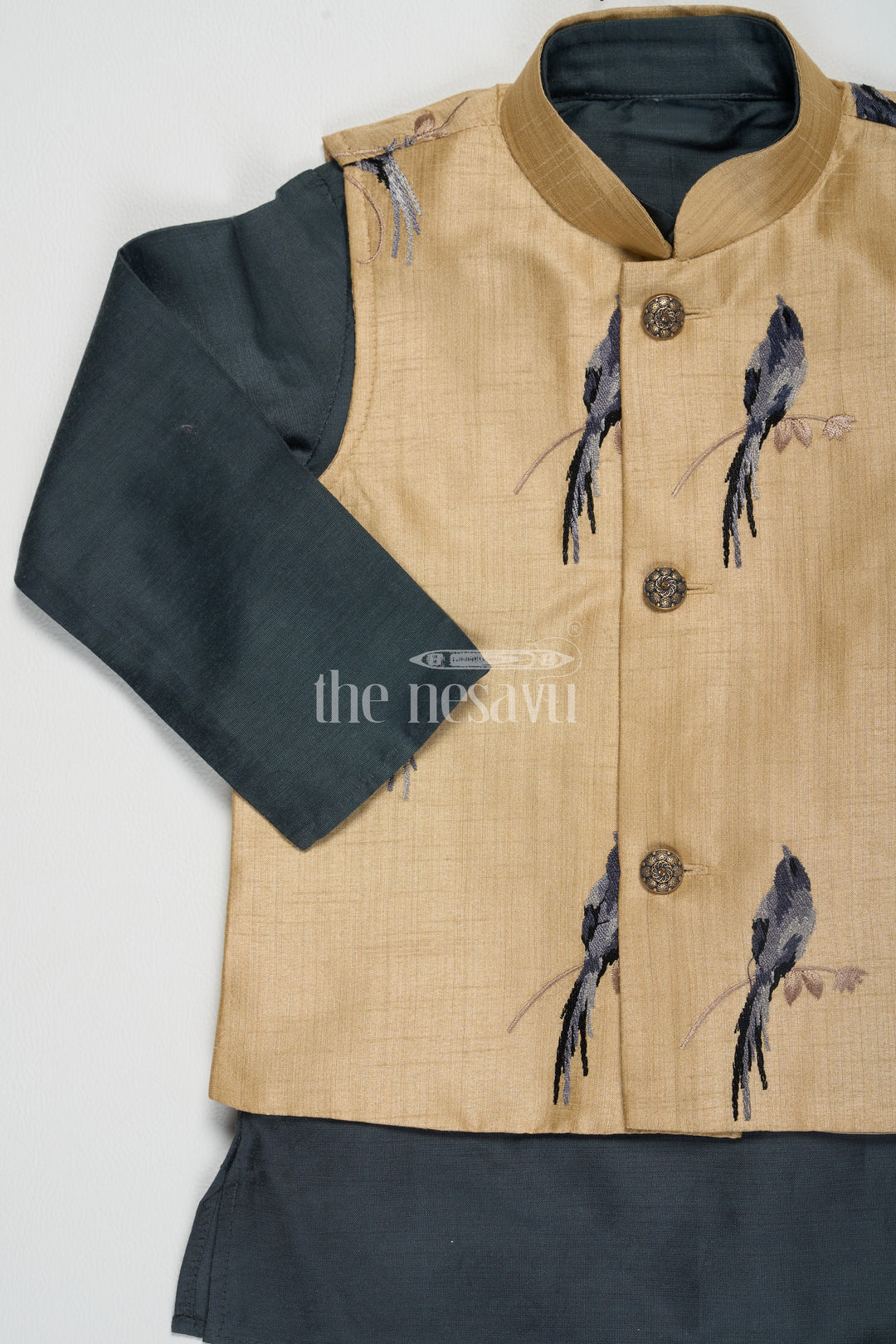 The Nesavu Boys Dothi Set Boys Black Silk Blend Dhoti Set with Green Kurta and Nehru Jacket for Special Festive Occasions Nesavu Nesavu Boys Green Kurta Black Dhoti Set Beige Nehru Jacket Festive Cultural Occasions