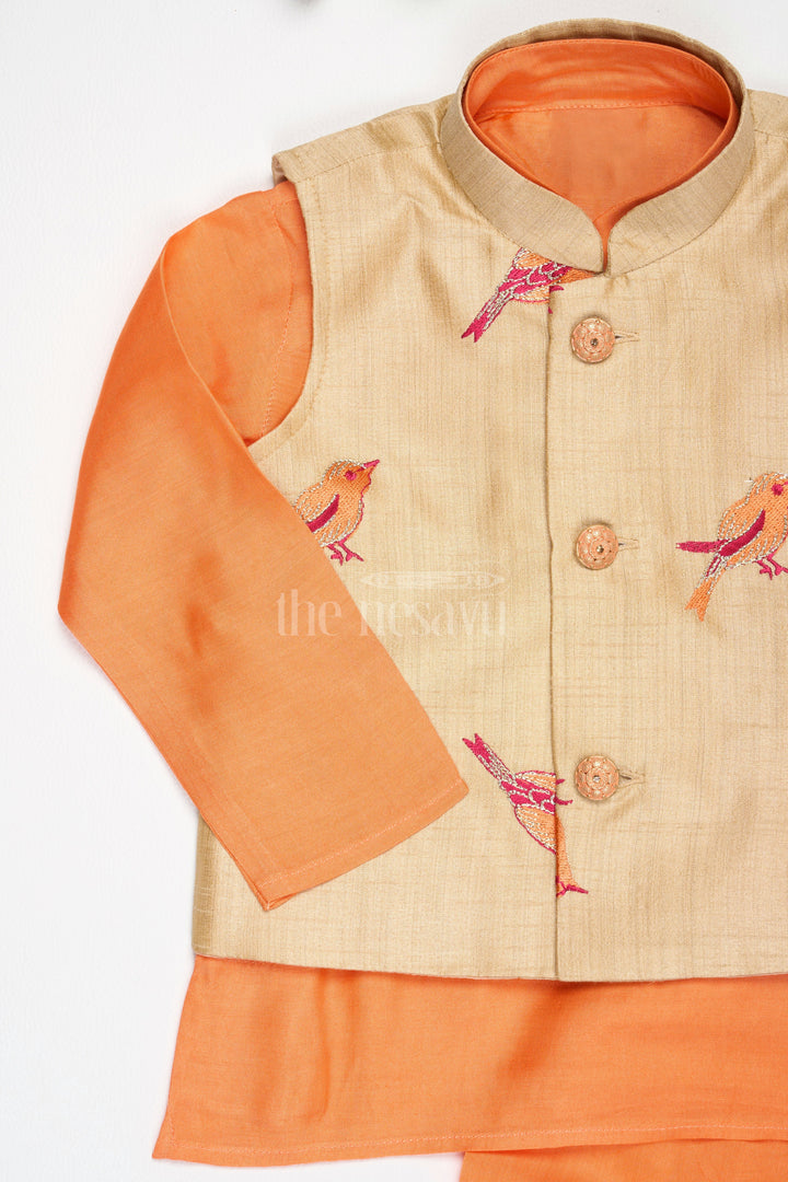 The Nesavu Boys Dothi Set Boys Orange Silk Blend Dhoti Set with Embroidered Bird Motif Jacket for Traditional Gatherings Nesavu Nesavu Boys Orange Dhoti Set Embroidered Nehru Jacket Festive Cultural Events