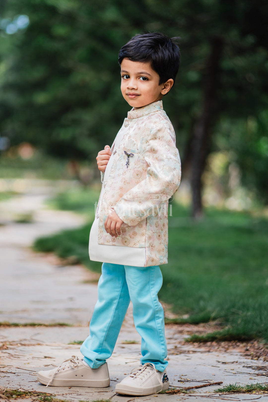 The Nesavu Boys Blazer Set Boys Sherwani Set with Pastel Floral Jacket and Blue Trousers for Weddings and Festivals Nesavu Nesavu Boys Sherwani Set Pastel Floral Jacket Blue Trousers Formal Occasions