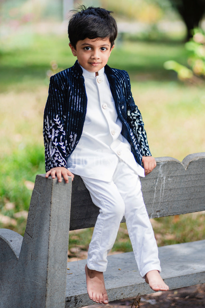 The Nesavu Boys Blazer Set Boys Velvet Sherwani Set in Blue with Embroidered Jacket and White Pants Nesavu Nesavu Boys Blue Velvet Sherwani Set Embroidered Jacket White Pants Formal Occasions