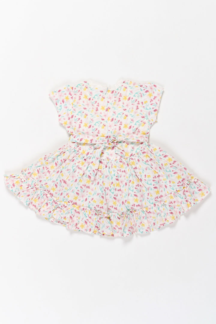 The Nesavu Girls Cotton Frock Casual Floral Frock for Girls with White Lace Bodice and Delicate Ruffle Hem Nesavu Nesavu Casual Floral Frock Girls Lace Bodice Ruffled Hem Perfect Playful Days