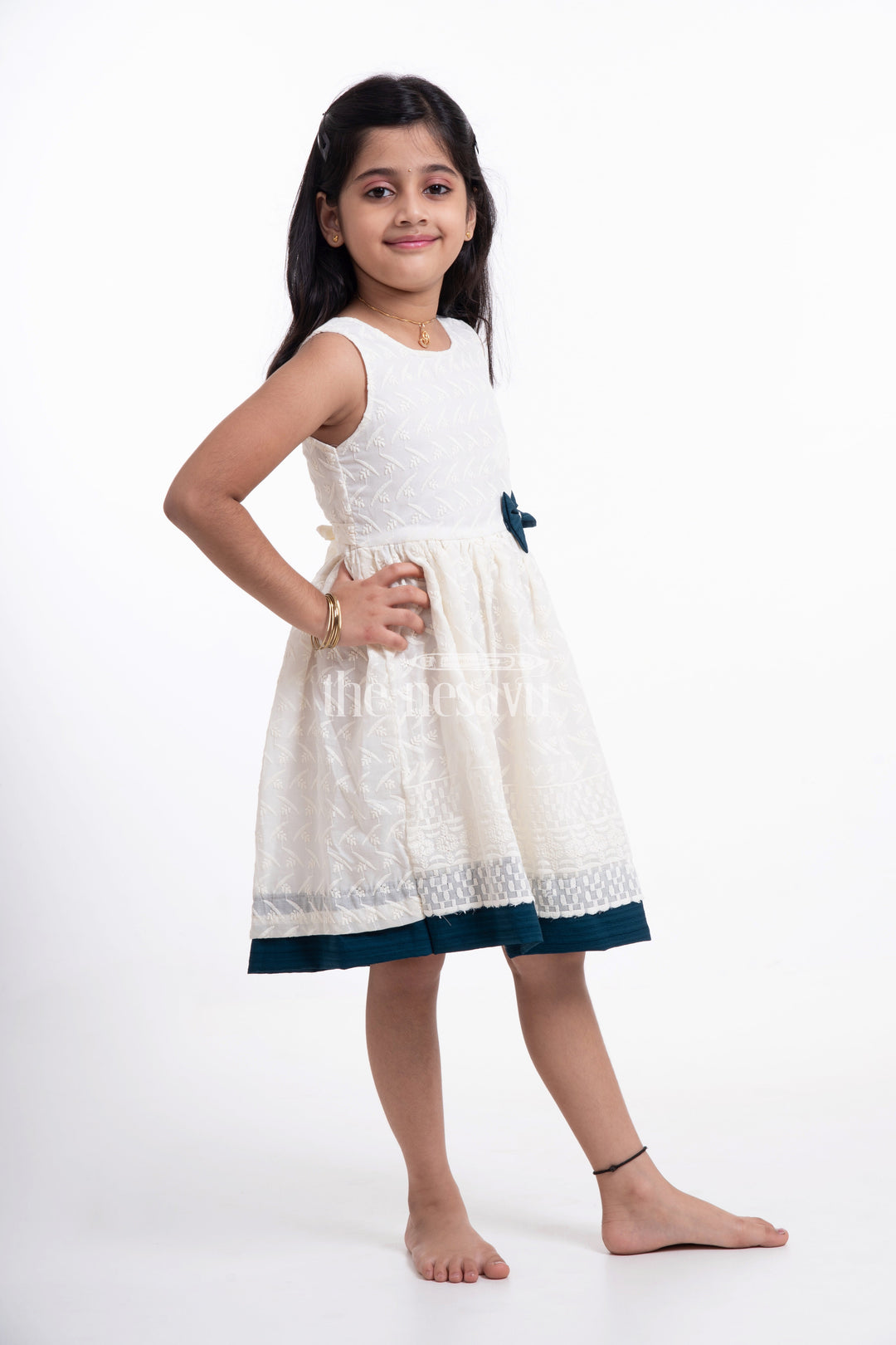 The Nesavu Girls Casual Gown Chic Cotton Dress - Sleeveless Chikankari Baby Frock with Navy Bow Nesavu Chic Cotton Dress - Nesavu | Chikankari Baby Frock with Navy Bow