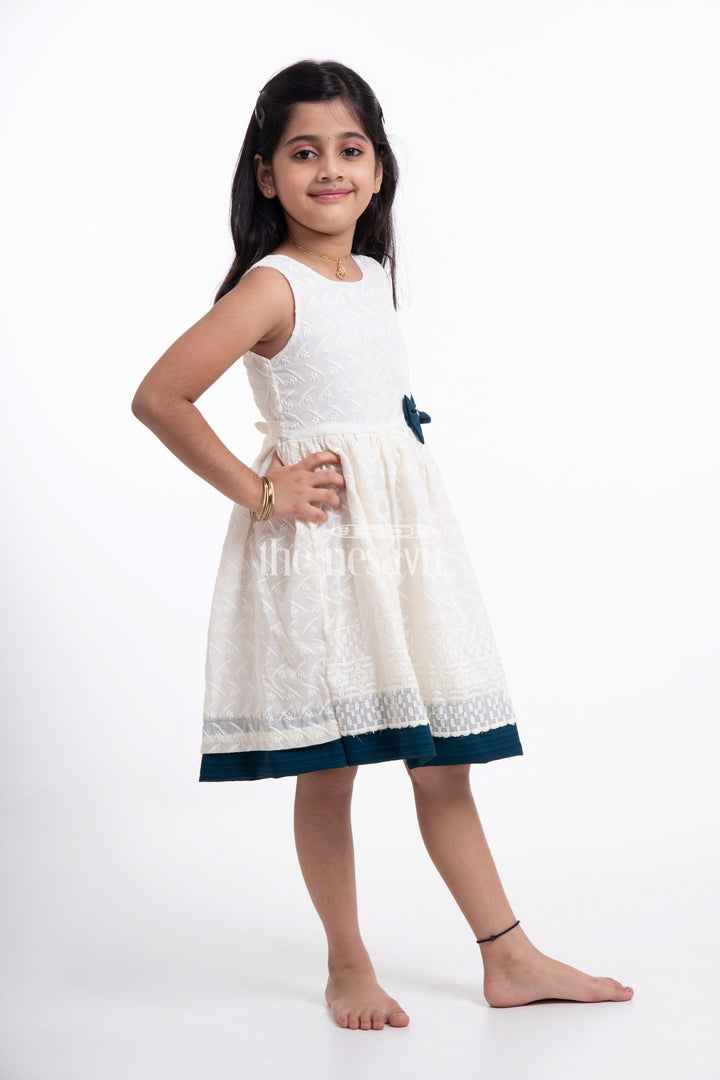 The Nesavu Girls Casual Gown Chic Cotton Dress - Sleeveless Chikankari Baby Frock with Navy Bow Nesavu Chic Cotton Dress - Nesavu | Chikankari Baby Frock with Navy Bow