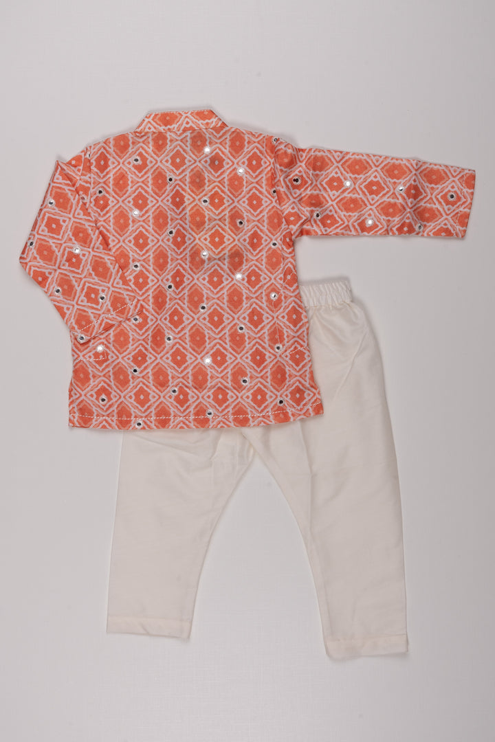 The Nesavu Boys Kurtha Set Citrus Charm: Mirror-Embroidered Geometric Printed Orange Kurta Shirt & Pant Set for Boys Nesavu Premium Boys Kurta with Pant Collections | Traditional Elegance Redefined | The Nesavu