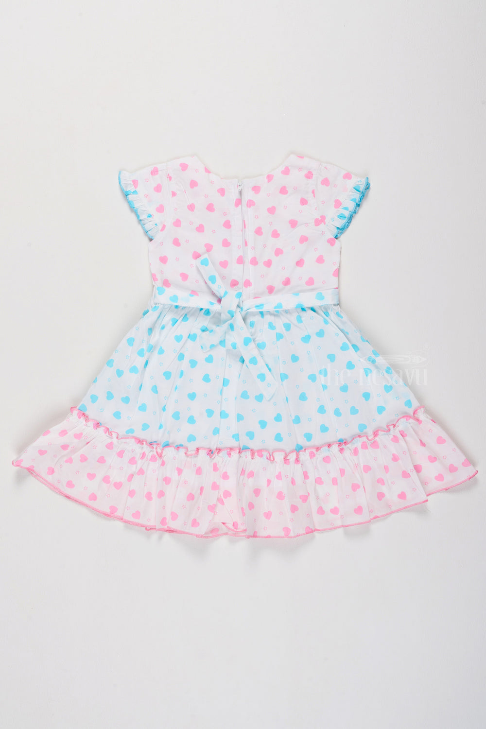 The Nesavu Girls Cotton Frock Cotton Ruffle Dress for Girls with Heart Prints and Elegant Bow Nesavu Girls Cotton Ruffle Dress Heart Print Stylish Bow