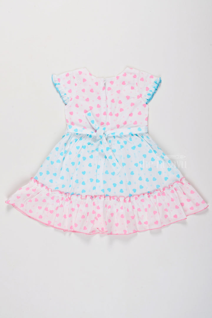 The Nesavu Girls Cotton Frock Cotton Ruffle Dress for Girls with Heart Prints and Elegant Bow Nesavu Girls Cotton Ruffle Dress Heart Print Stylish Bow