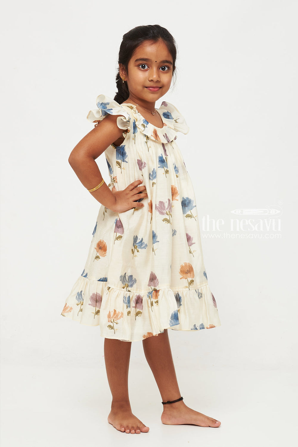 The Nesavu Girls Fancy Frock Cream and Blue Floral Designer Printed Chanderi Pleated Frock for Girls Nesavu Cream and Blue Floral Chanderi Pleated Frock for Girls - Charming & Sophisticated