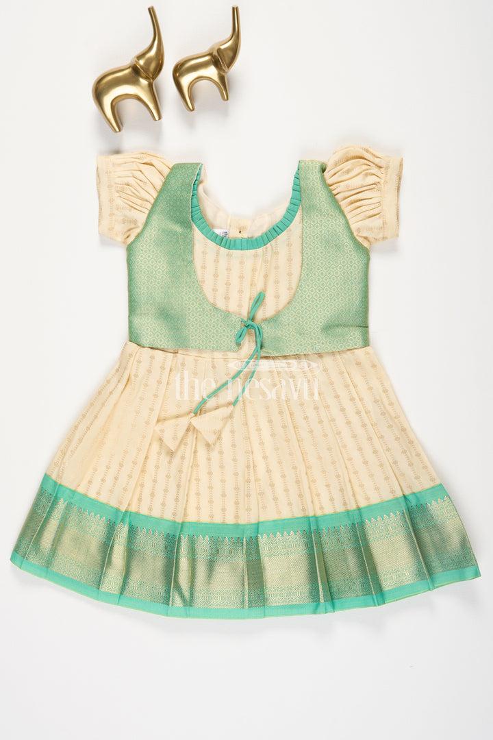 The Nesavu Girls Kanchi Silk Frock Cream and Green Semi Kanchivaram Silk Frock with Golden Stripes and Brocade Border for Girls Nesavu 14 (6M) / Green / Style 3 SF862BC-14 Nesavu Cream Green Semi Kanchivaram Silk Frock Brocade Border Puff Sleeves Girls