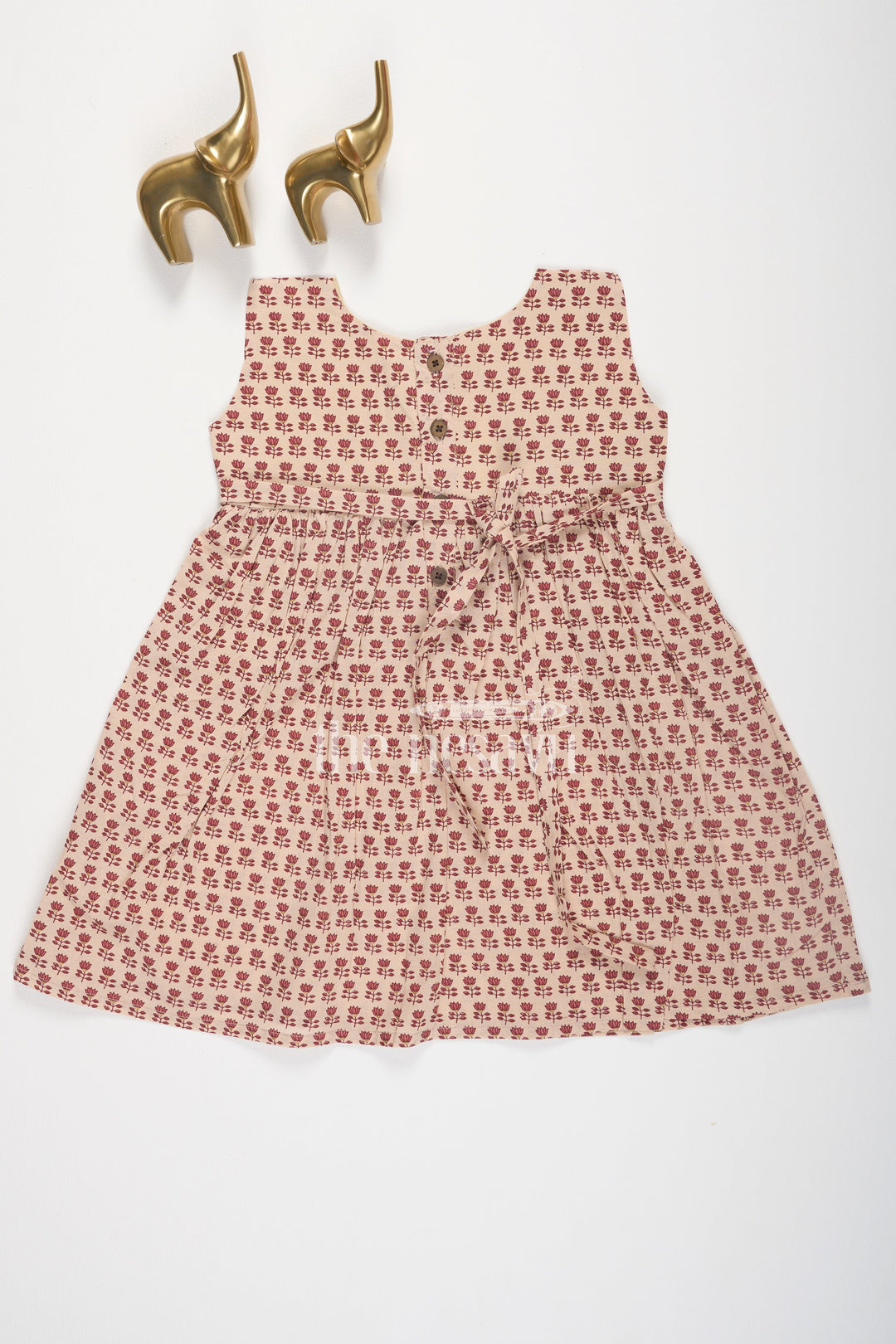 The Nesavu Baby Cotton Frocks Cream and Maroon Floral Print Cotton Baby Frock for Girls with Pleated Design Nesavu Cream and Maroon Floral Print Cotton Baby Frock for Girls with Pleated Design Nesavu