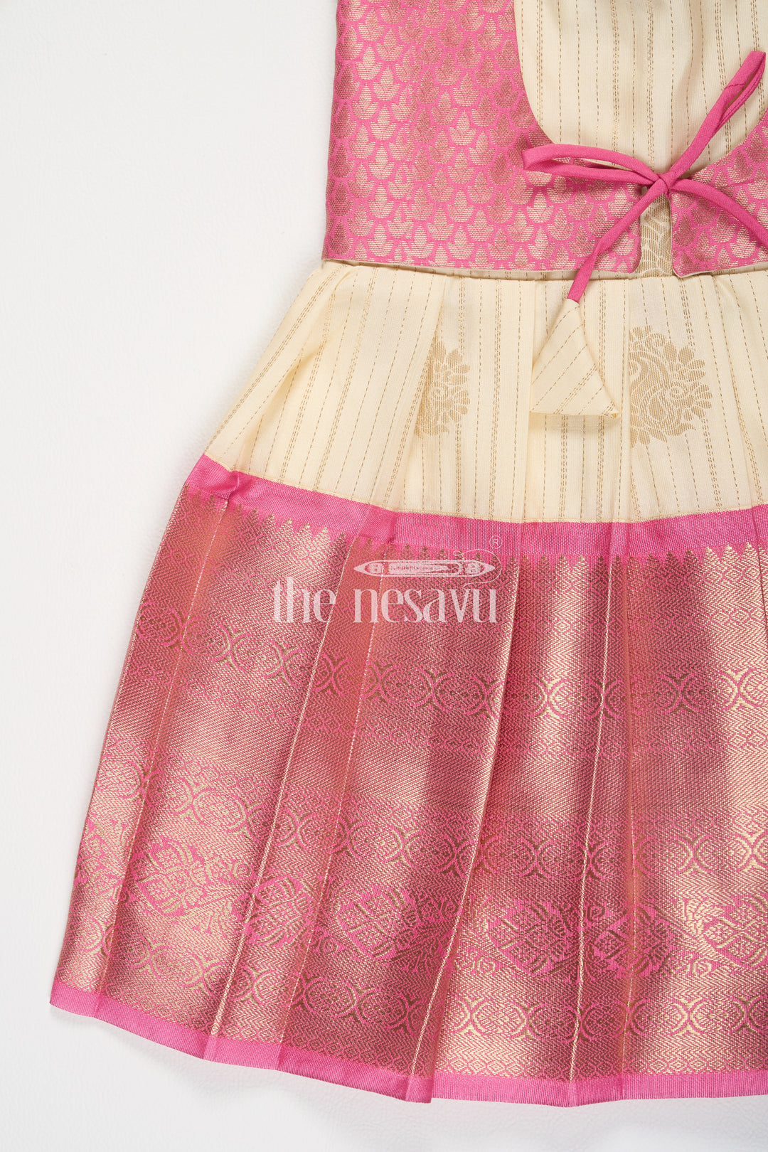 The Nesavu Girls Kanchi Silk Frock Cream and Pink Semi Kanchivaram Silk Frock with Brocade Bodice and Puff Sleeves for Girls Nesavu Nesavu Girls Semi Kanchivaram Silk Frock Cream Pink Brocade Bodice Puff Sleeves