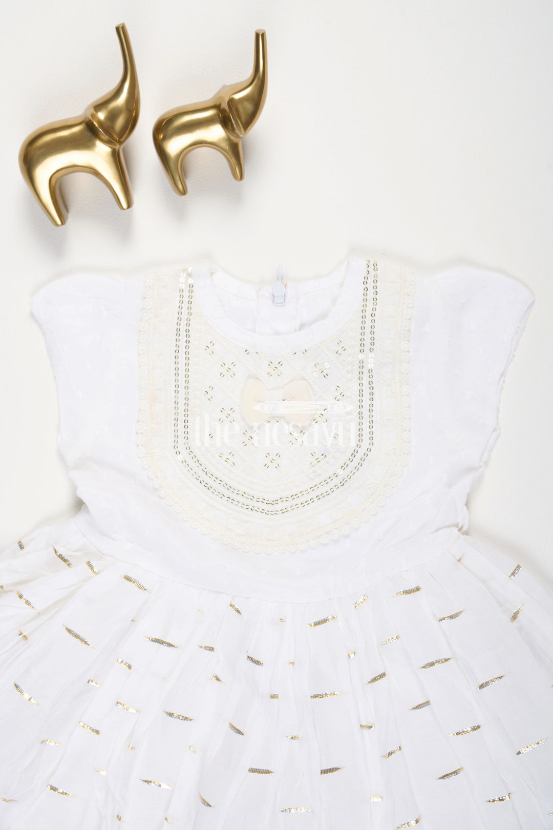 The Nesavu Baby Cotton Frocks Cream Cotton Modal Frock for Baby Girls with Sequins Embroidered Yoke Nesavu Cream Cotton Modal Frock for Baby Girls with Sequins Embroidered Yoke Nesavu