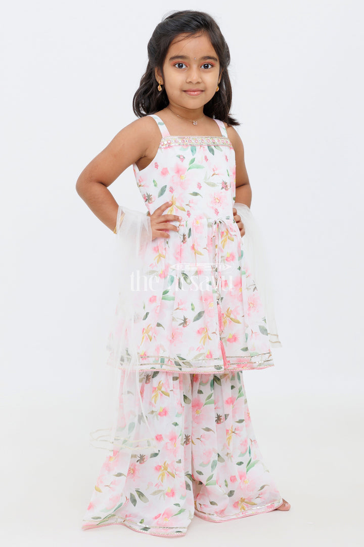 The Nesavu Girls Sharara / Plazo Set Cream Georgette Floral Peplum Top and Sharara Set for Girls with Tassel Detailing Nesavu Cream Floral Peplum Top and Sharara Set for Girls with Tassel Detailing Nesavu