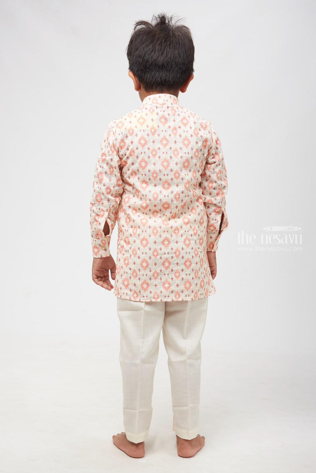 The Nesavu Boys Kurtha Set Desert Mirage: Peach and White Ikat Kurta with Pristine White Pants for Boys Nesavu Boys Kurta with Sleek Pant Set | Festive Fusion Wear | The Nesavu