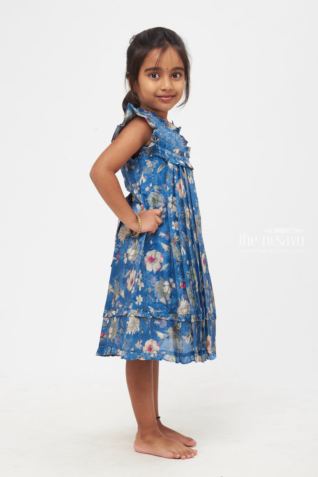 The Nesavu Girls Cotton Frock Elegant Floral-Printed Blue Frock with Pleats for Girls Nesavu Captivating Floral-Printed Blue Frock for Girls | Nature-inspired Elegance | The Nesavu