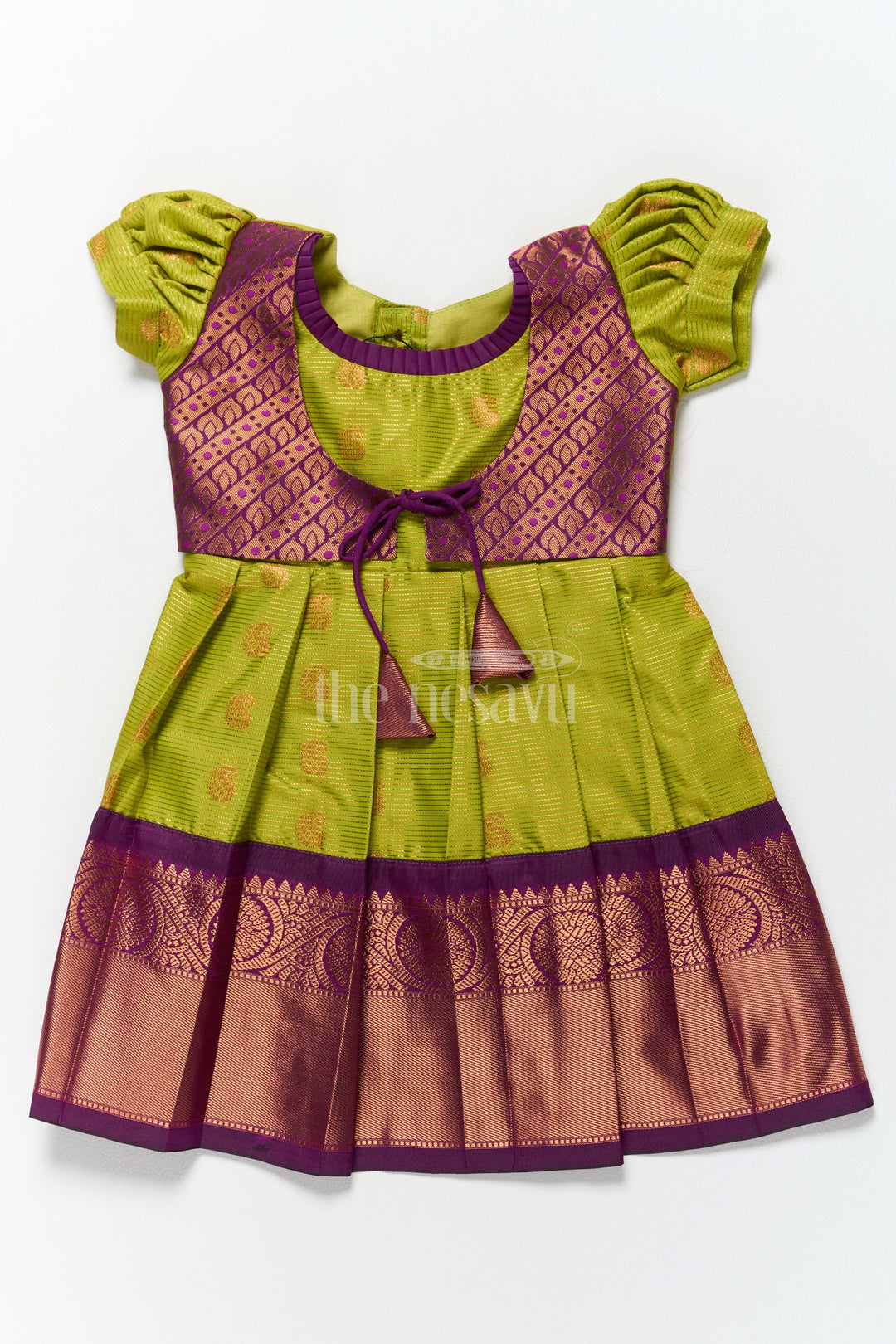 The Nesavu Girls Kanchi Silk Frock Elegant Girls Kanchi Silk Frock with Intricate Purple Border for Pongal Dressing Nesavu 14 (6M) / Green / Style 1 SF858EA-14 Pongal Special Girls Kanchi Silk Frock Lime Green Purple Design Nesavu