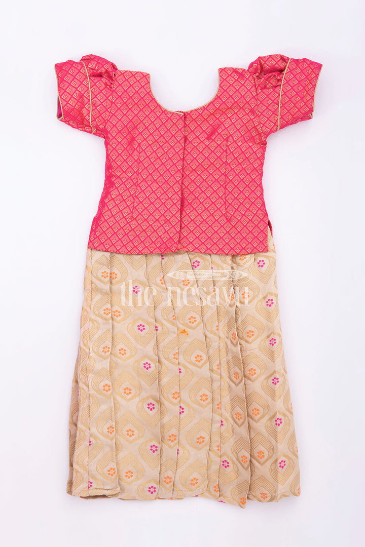 The Nesavu Pattu Pavadai Elegant Pink and Gold Silk Pattu Pavadai for Kids Nesavu Pink and Gold Silk Pattu Pavadai for Kids - Traditional Festive Wear