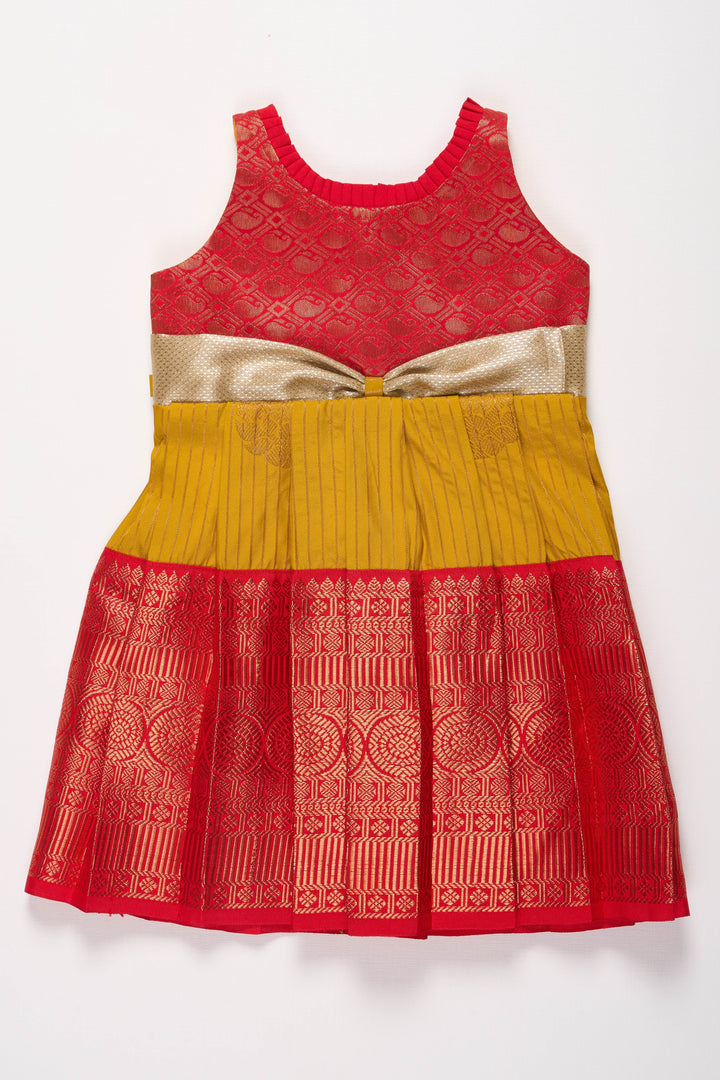 The Nesavu Girls Kanchi Silk Frock Elegant Red and Yellow Silk Frock for Girls Nesavu Elegant Red and Yellow Silk Frock for Girls with Silver Bow