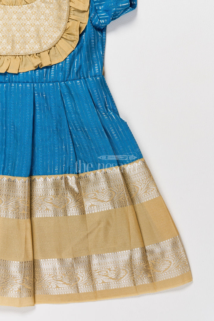 The Nesavu Girls Kanchi Silk Frock Exquisite Blue and Gold Kanchi Silk Frock for Girls’ Pongal Celebrations Nesavu Festive Blue Gold Kanchi Silk Frock Girls Pongal Traditions Nesavu