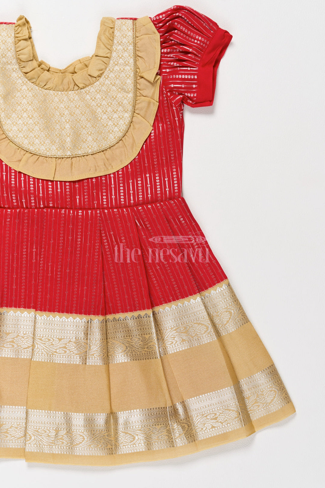 The Nesavu Girls Kanchi Silk Frock Festive Red Girls Kanchi Silk Frock with Radiant Golden Zari Border and Ruffled Yoke Nesavu Nesavu Festive Red Girls Kanchi Silk Frock Pongal Celebrations Golden Zari Details