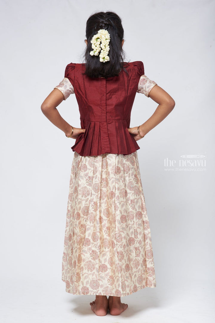 The Nesavu Pattu Pavadai Floral Printed Pleated Beige Skirt with Box Pleated Brown Jacquard Silk Blouse for Girls Nesavu Latest Pattu Pavadai Designs | Girls Pattu Langa | The Nesavu