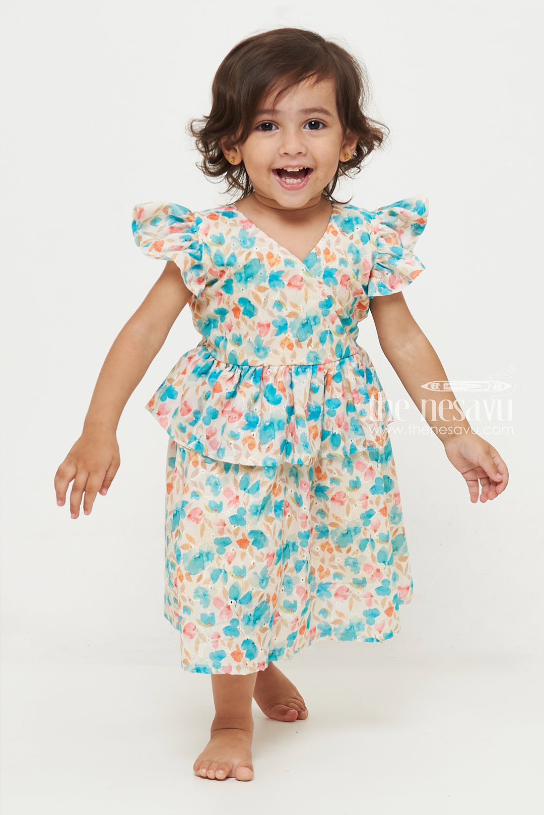 The Nesavu Baby Cotton Frocks Floral Ruffled Baby Dress with Cap Sleeves Nesavu Floral Ruffled Baby Dress with Cap Sleeves | Cute Baby Outfits