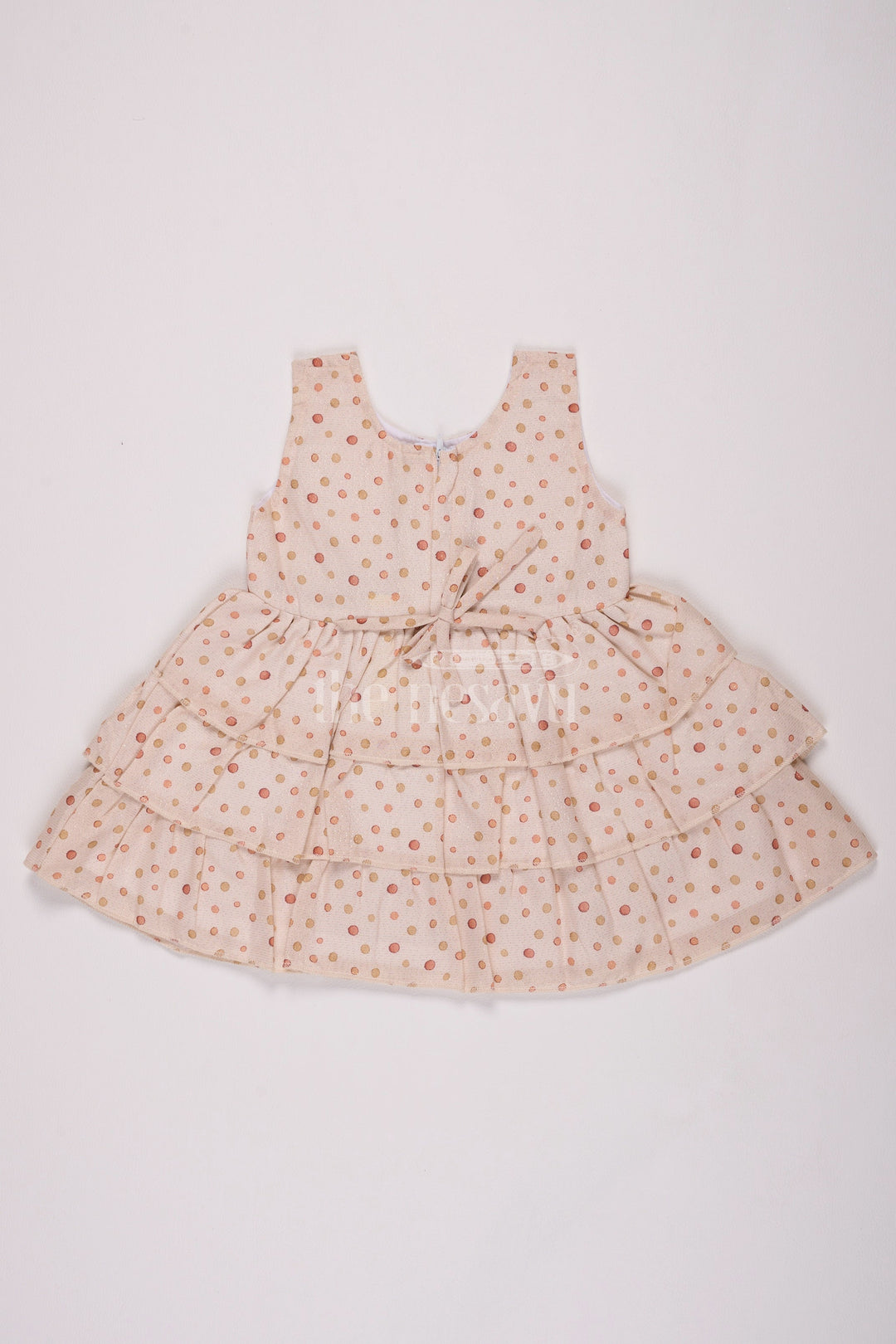 The Nesavu Baby Cotton Frocks Girls Cream Brasso Polka Dot Dress with Rust Bow and Layered Skirt for Festive Gatherings Nesavu Nesavu Girls Cream Brasso Dress Gold Polka Dots Layered Skirt Festive Events