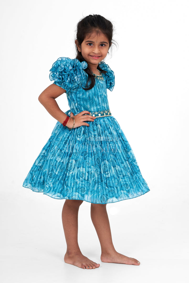 The Nesavu Silk Party Frock Girls Fancy Frock in Blue Organza Printed Fabric with Puff Sleeves and Floral Embellishments Nesavu Nesavu Girls Fancy Frock Teal Blue Puff Sleeves Floral Embellishments Organza