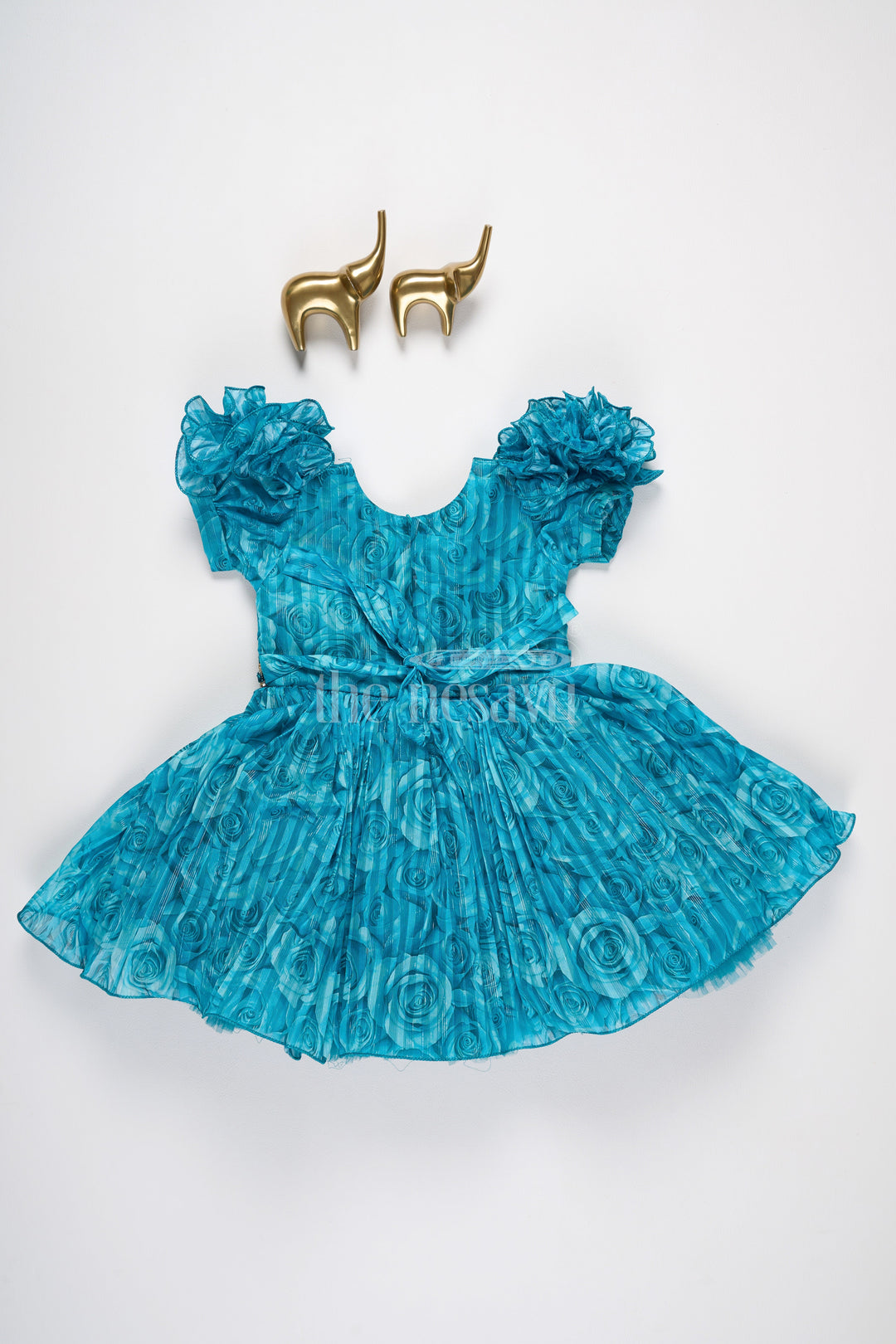 The Nesavu Silk Party Frock Girls Fancy Frock in Blue Organza Printed Fabric with Puff Sleeves and Floral Embellishments Nesavu Nesavu Girls Fancy Frock Teal Blue Puff Sleeves Floral Embellishments Organza