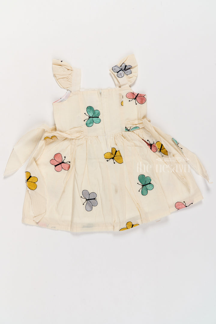 The Nesavu Girls Cotton Frock Girls Fancy Frock with Butterfly Embroidery and Ruffled Sleeves Nesavu Nesavu Girls Fancy Frock Butterfly Embroidery Ruffled Sleeves Side Bow