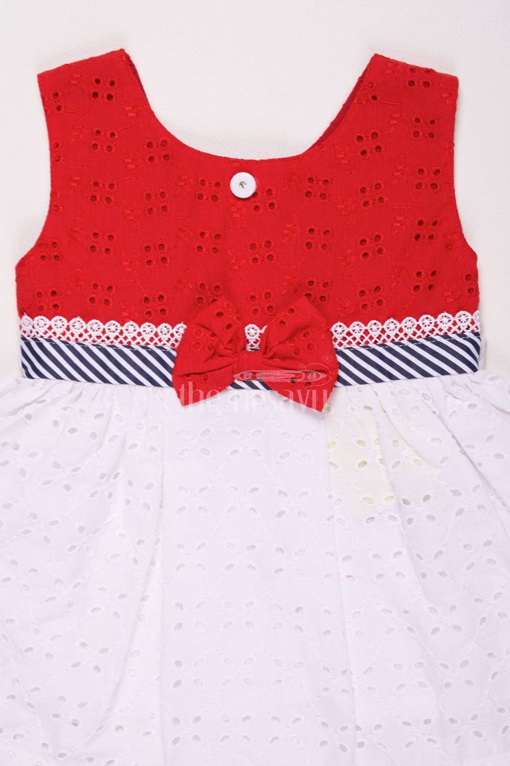 The Nesavu Baby Cotton Frocks Girls Red Cotton Frock with Eyelet Embroidery and Nautical Bow Detail for Casual Outings Nesavu Nesavu Girls Red White Cotton Frock Eyelet Embroidery Bow Detail Summer Parties