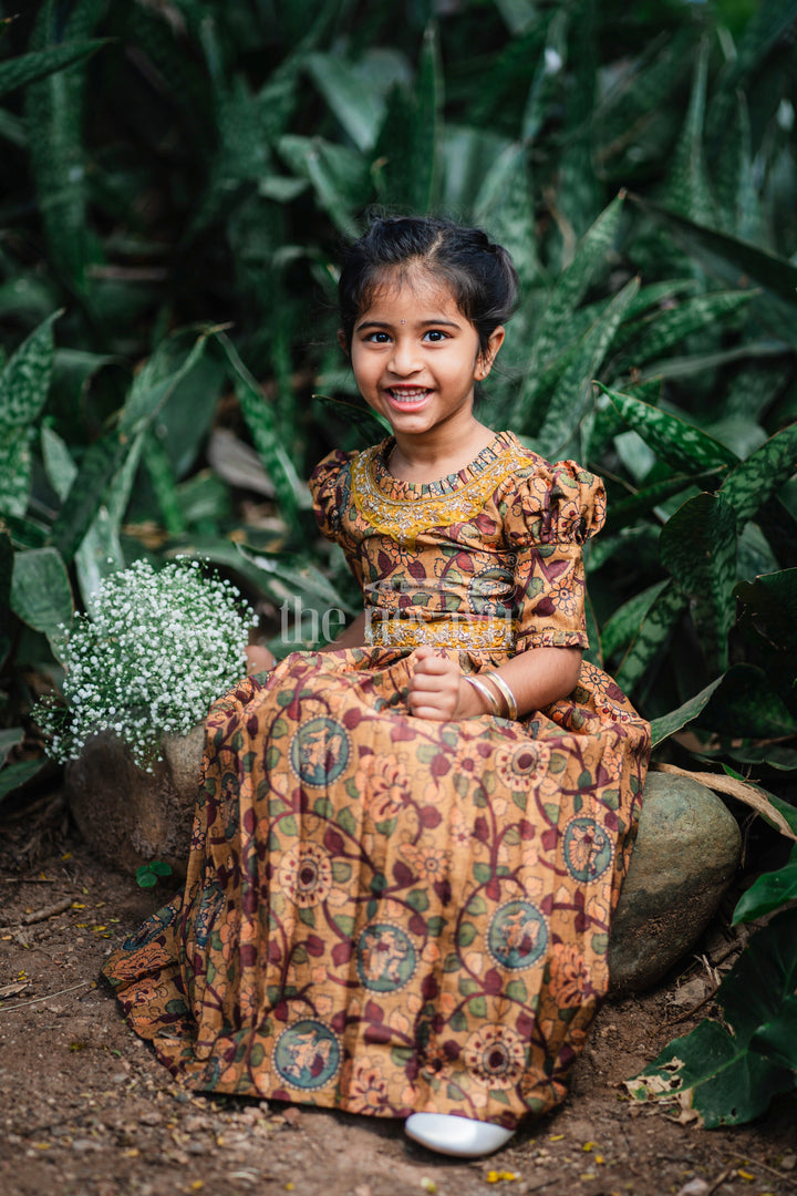 The Nesavu Girls Party Gown Girls Traditional Kalamkari Print Anarkali Gown in Earthy Yellow Tones Nesavu Yellow Kalamkari Anarkali Gown for Girls | Traditional Long Dress | The Nesavu