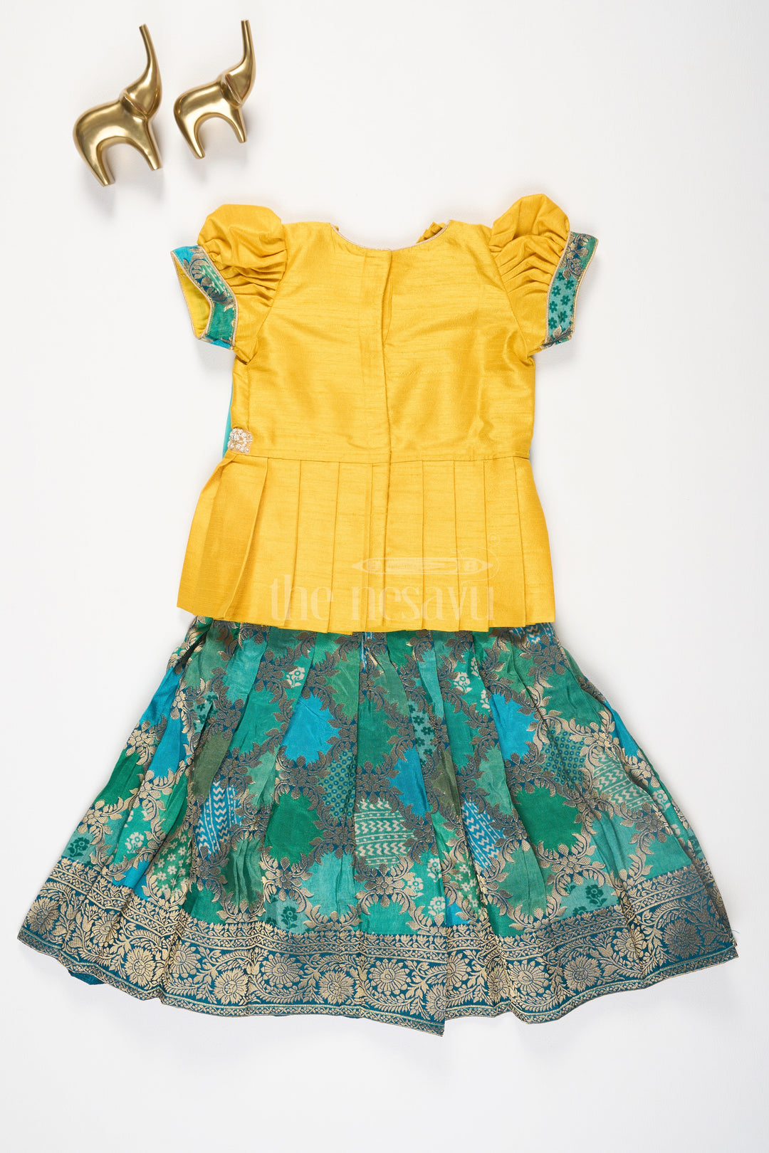 The Nesavu Pattu Pavadai Girls Yellow and Green Pattu Pavadai Set with Puff Sleeves and Beaded Waistline Detailing Nesavu Nesavu Girls Pattu Pavadai Yellow Green Puff Sleeves Beaded Waistline