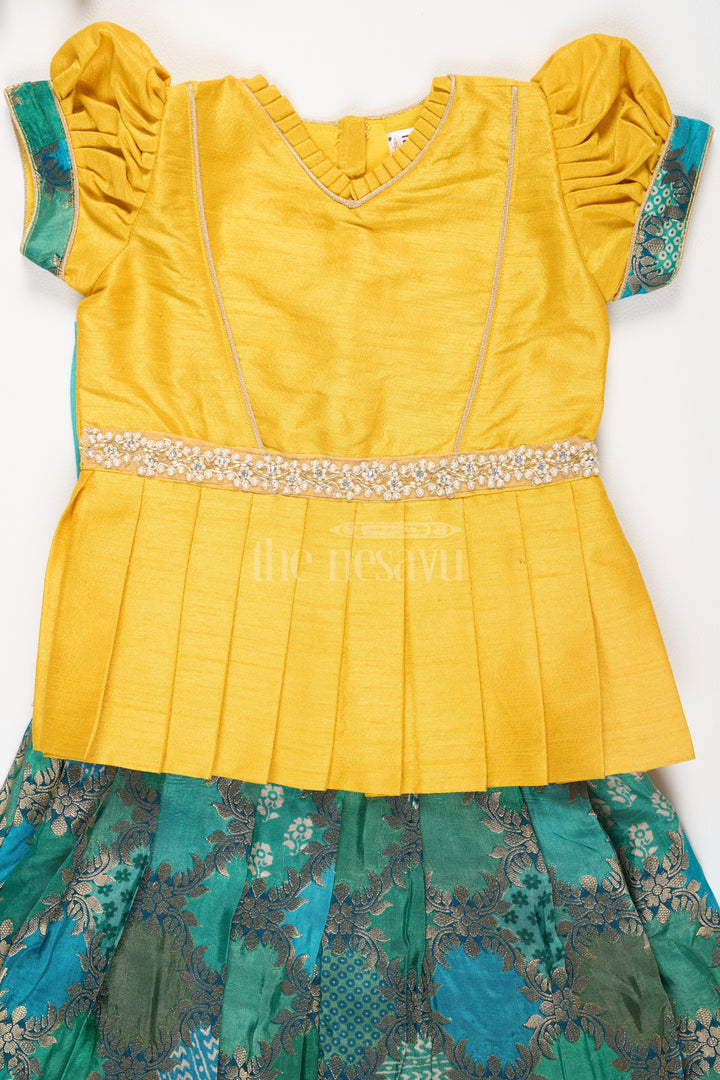 The Nesavu Pattu Pavadai Girls Yellow and Green Pattu Pavadai Set with Puff Sleeves and Beaded Waistline Detailing Nesavu Nesavu Girls Pattu Pavadai Yellow Green Puff Sleeves Beaded Waistline