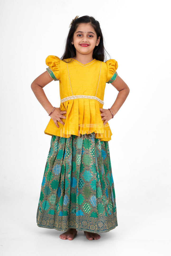 The Nesavu Pattu Pavadai Girls Yellow and Green Pattu Pavadai Set with Puff Sleeves and Beaded Waistline Detailing Nesavu Nesavu Girls Pattu Pavadai Yellow Green Puff Sleeves Beaded Waistline