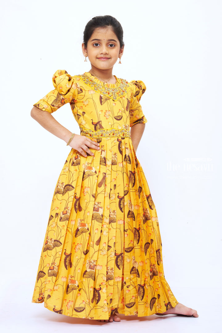 The Nesavu Girls Party Gown Girls Yellow Kalamkari Print Anarkali Gown with Embellished Neckline Nesavu Girls' Festive Goldenrod Kalamkari Anarkali Gown | The Nesavu