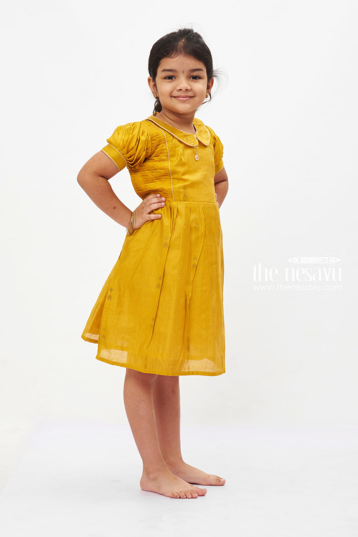 The Nesavu Girls Cotton Frock Golden Sunshine Puff Sleeve Dress: Girls' Mustard Yellow Frock with Shimmer Accents Nesavu Vibrant Mustard Yellow Girls Dress with Puff Sleeves | Shimmering Party Frock | The Nesavu