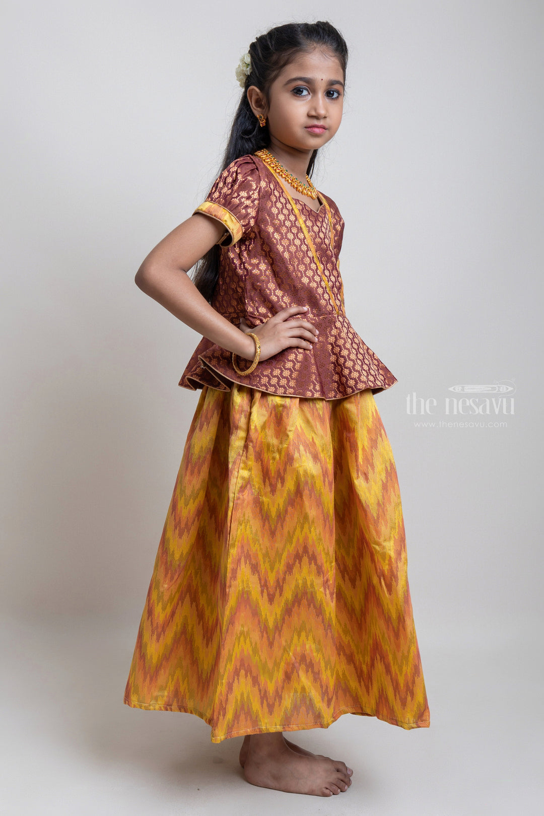 The Nesavu Pattu Pavadai Gorgeous Brown Floral Designed Silk Blouse With Ziz-Zag Pattu Pavadai For Girls Nesavu Traditional Wear For Girls | Latest Pattu Pavadai | The Nesavu